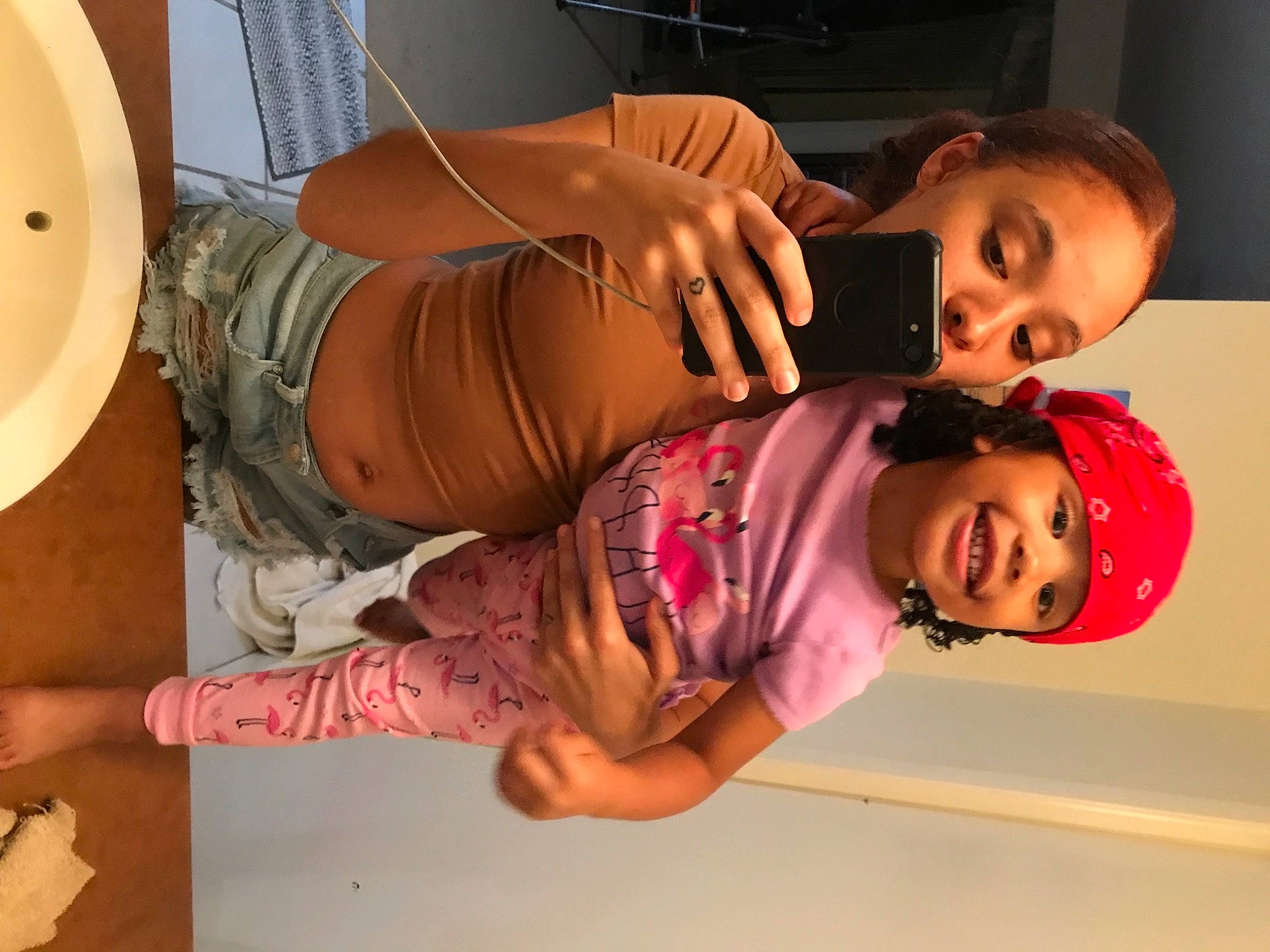 Jazelle is registered to the contest to win money with this photo: arm, beauty, elbow, event, eye, eyelash, eyewear, fun, gesture, happy, headwear, human_body, human_leg, joint, joy, leg, mouth, organ, person, room