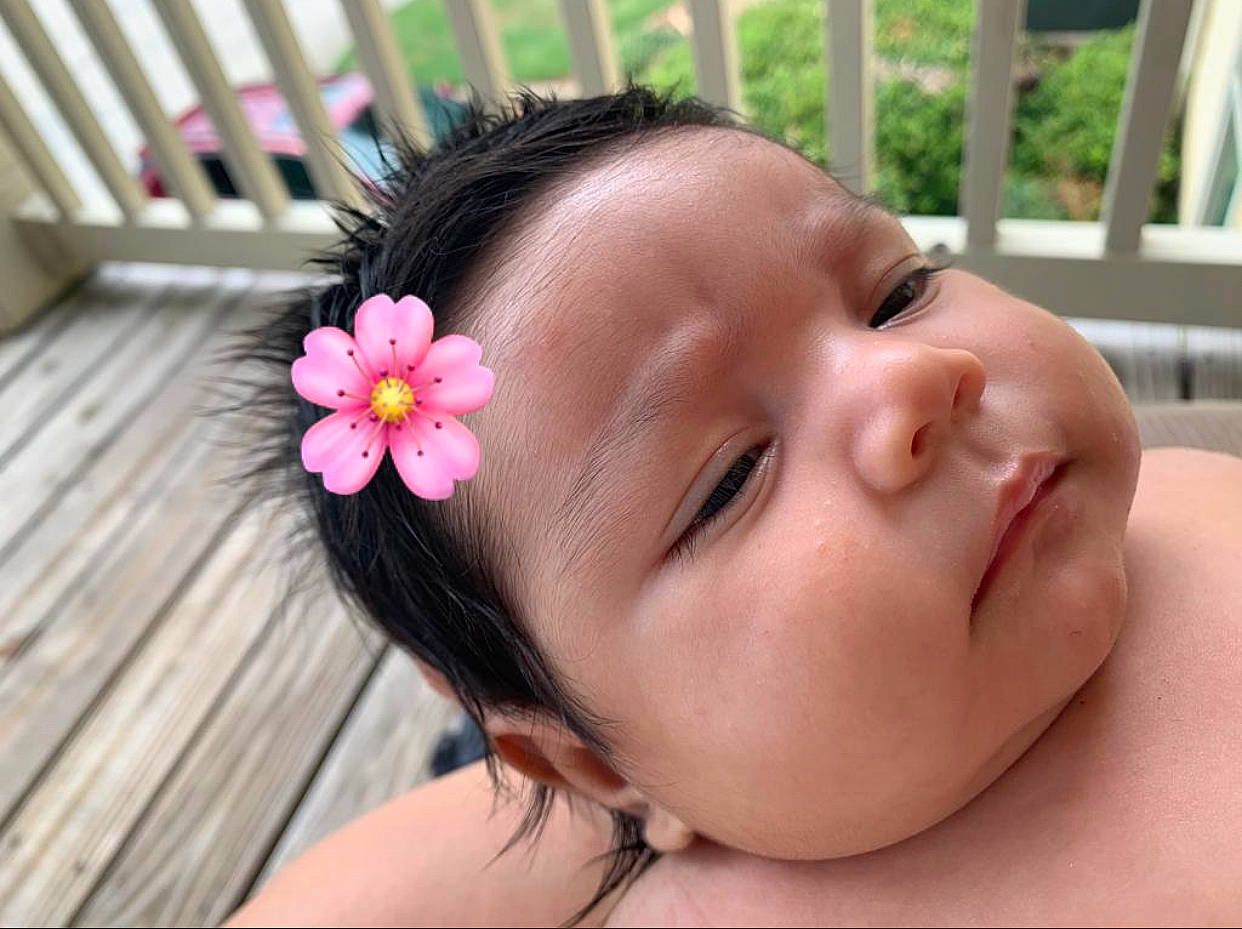 Lyanna is registered to the contest to win money with this photo: baby, beauty, cheek, child, chin, close_up, ear, face, fashion_accessory, hair_accessory, head, headband, headgear, lip, mouth, neck, nose, person, pink, skin