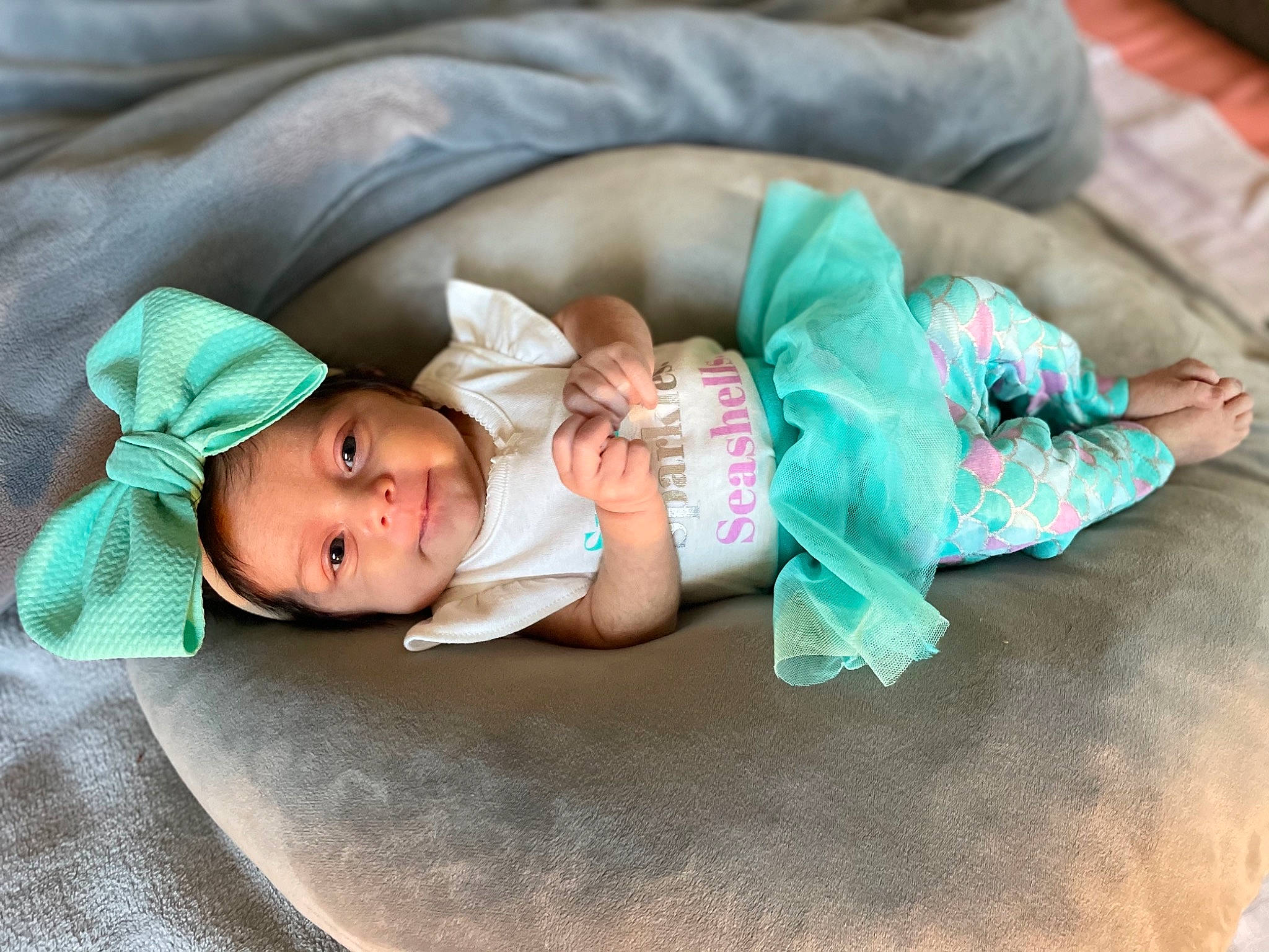 Milayah joined the competition — help win amazing prizes! baby, baby_products, baby_toddler_clothing, bedtime, child, comfort, couch, eye, grass, grey, hand, head, headwear, human_body, linens, nap, person, sitting, skin, toddler