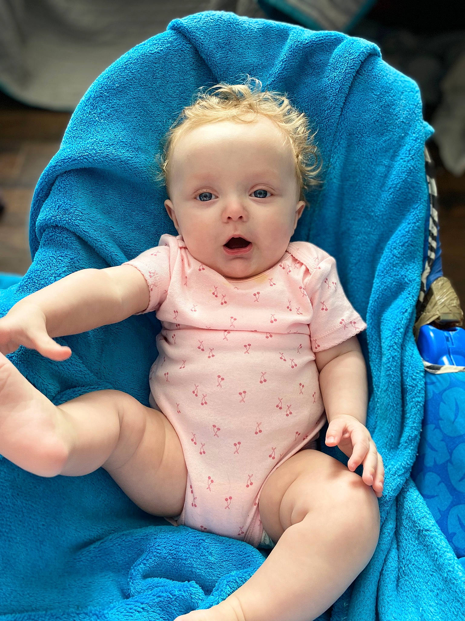 Amara joined the competition — help win amazing prizes! abdomen, baby, baby_products, baby_toddler_clothing, blue, cheek, child, electric_blue, foot, happy, human_leg, iris, nail, pattern, person, pink, purple, skin, surprise, textile
