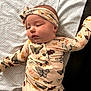 Arden joined the competition — help win amazing prizes! baby, infant, child, butterfly, headband, blanket, sleepy, clothing, pattern, soft, lying_down, cute, portrait, indoor, person, young, apparel, fabric, face, resting