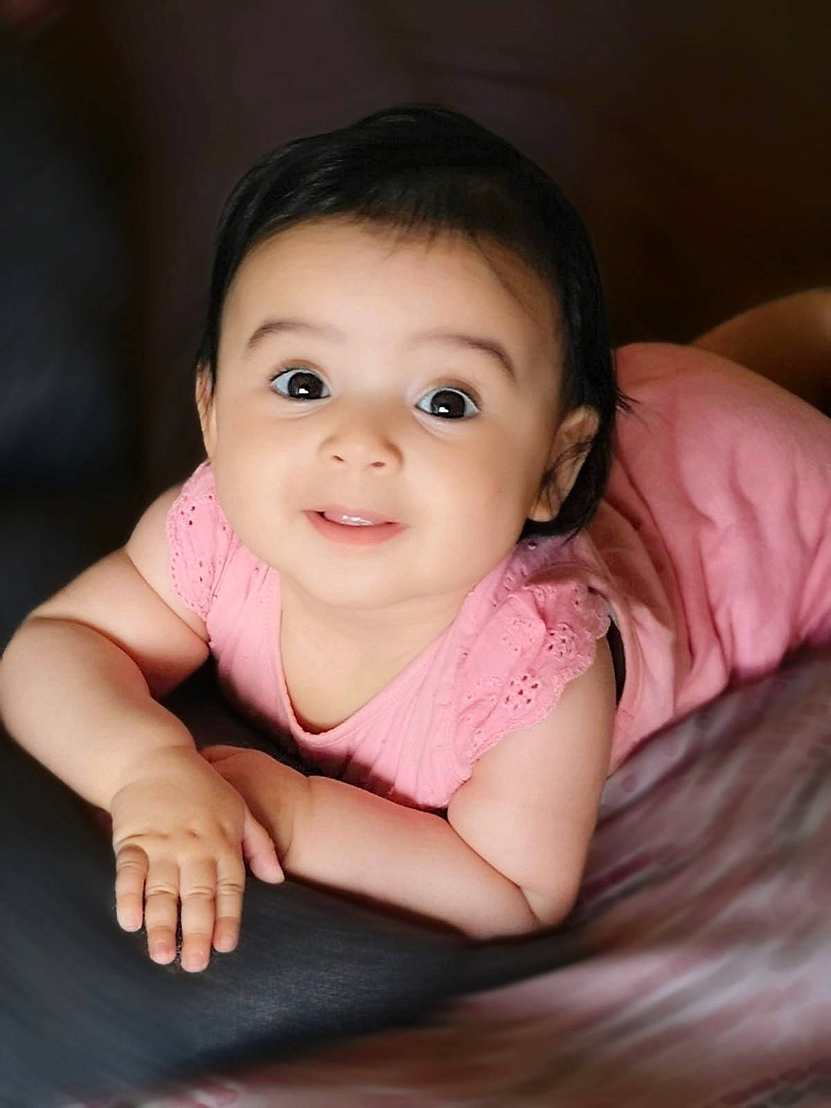 Sylia participe au concours pour gagner de l'argent avec cette photo : baby, baby_toddler_clothing, black_hair, cheek, chin, comfort, eyebrow, eyelash, flash_photography, fun, happy, iris, lip, mouth, nose, person, sitting, skin, sleeve, smile