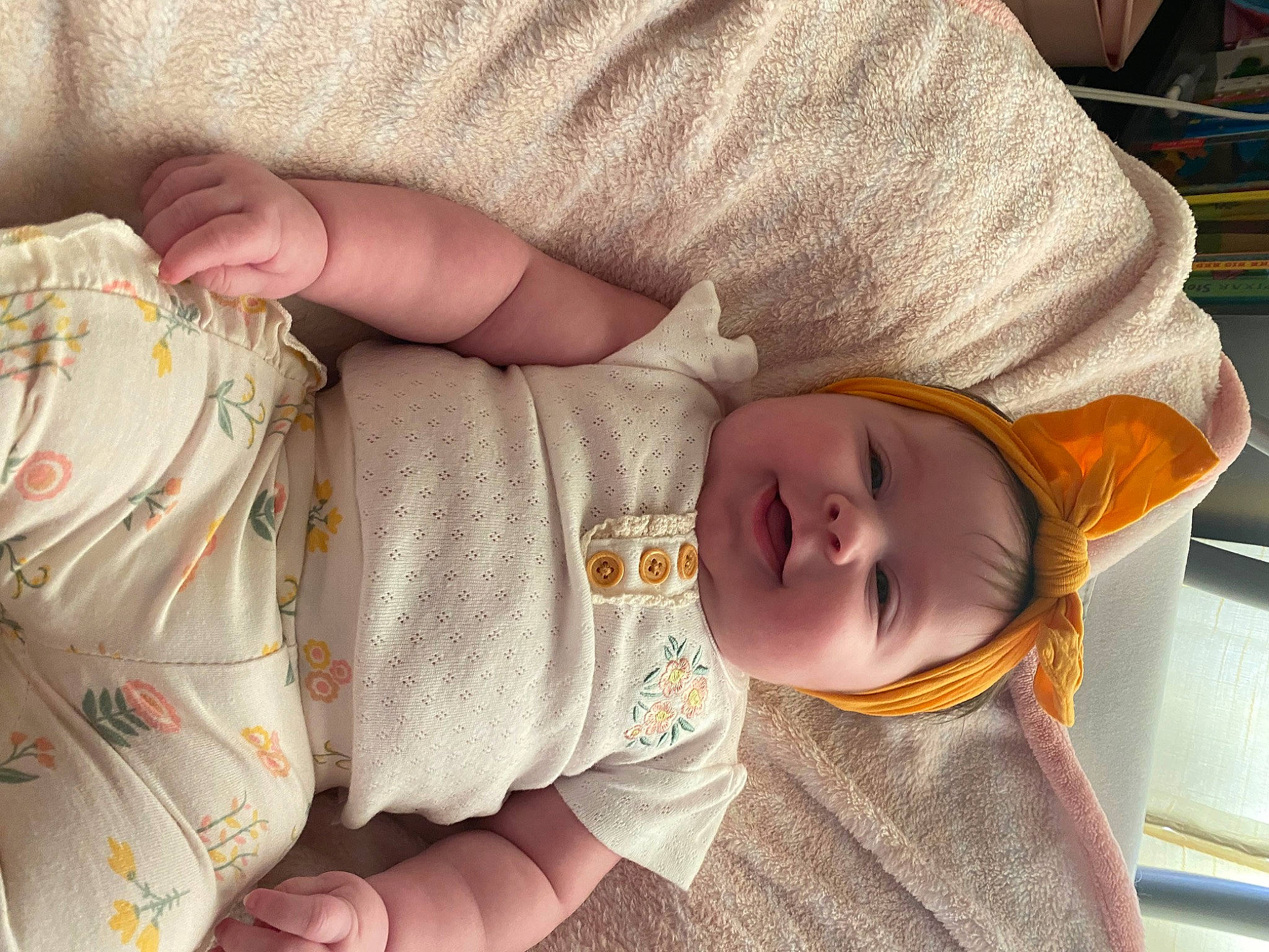 Eloise is registered to the contest to win money with this photo: baby, baby_toddler_clothing, cheek, child, comfort, eye, finger, head, headgear, iris, linens, mammal, nail, nose, person, product, skin, sleeve, textile, thumb