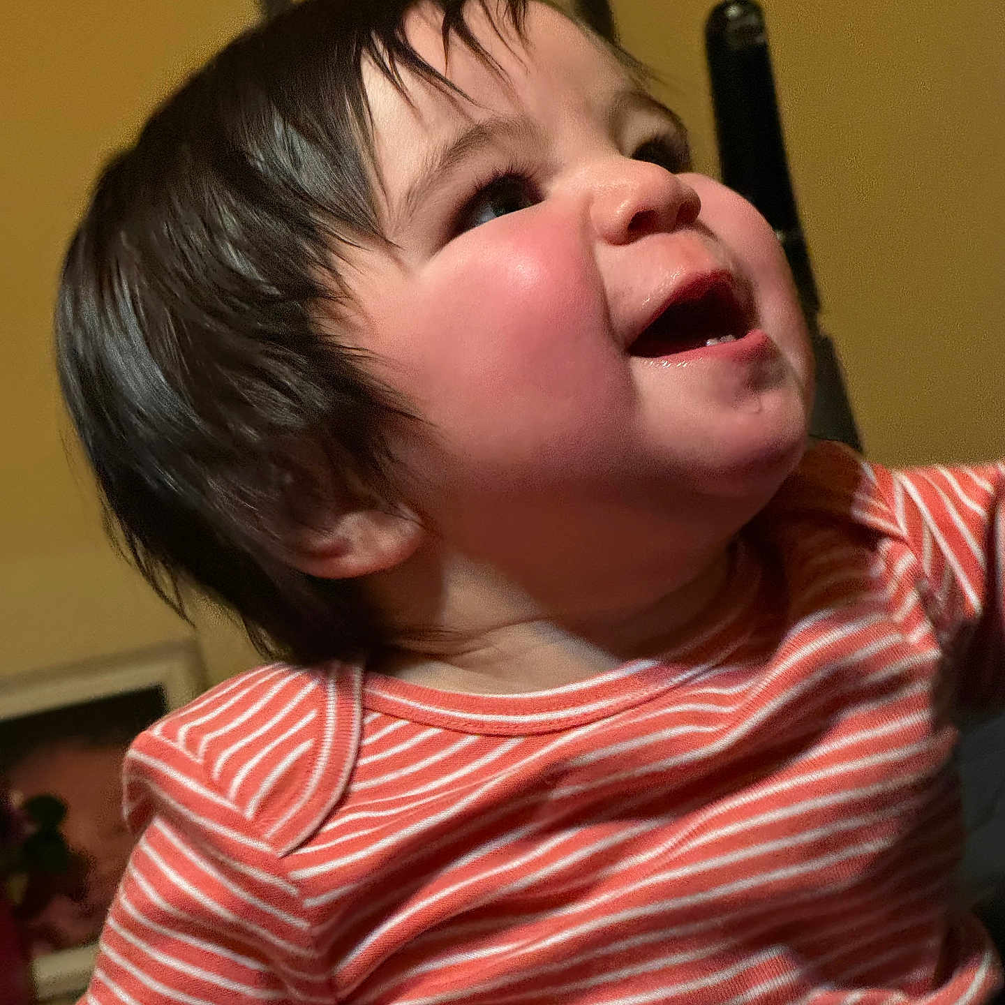 Sean is registered to the contest to win money with this photo: baby, bodypart, clothing, face, finger, frown, hand, happy, head, laughing, longsleeve, mouth, person, photography, portrait, sad, shirt, smile, t_shirt, teeth