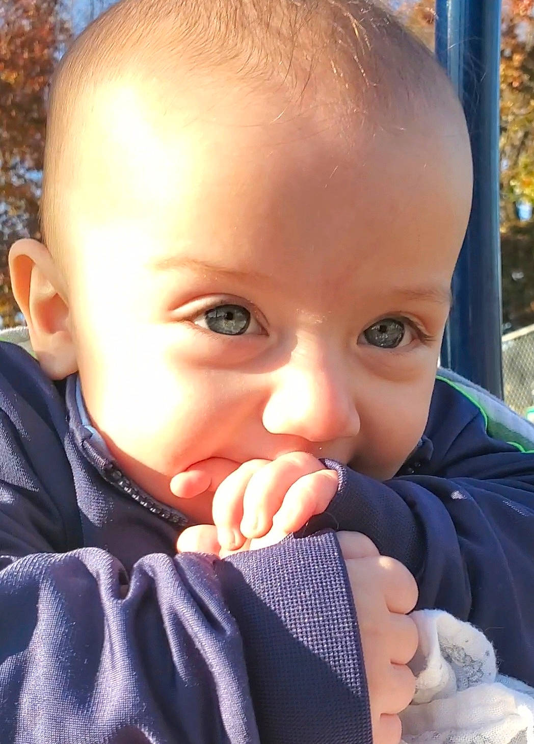 Matteo is registered to the contest to win money with this photo: baby, baby_toddler_clothing, cheek, child, chin, ear, eyelash, finger, gesture, grass, hand, happy, human_body, iris, lip, mouth, nose, person, skin, thumb