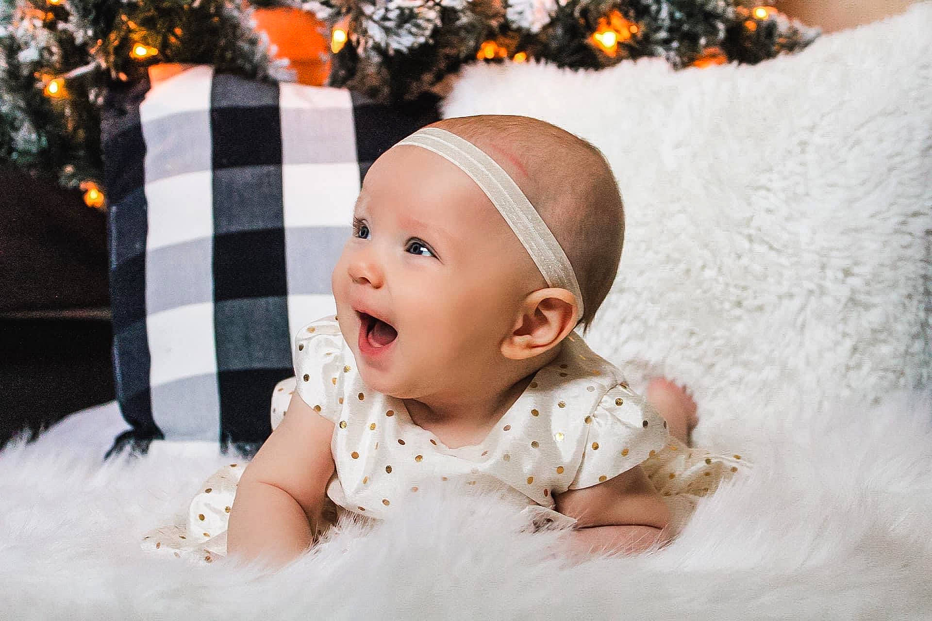 Dahlia is registered to the contest to win money with this photo: baby, baby_toddler_clothing, child, christmas_decoration, comfort, costume_hat, event, fashion_accessory, flash_photography, fun, hair_accessory, happy, headgear, headpiece, headwear, linens, pattern, person, photograph, sleeve