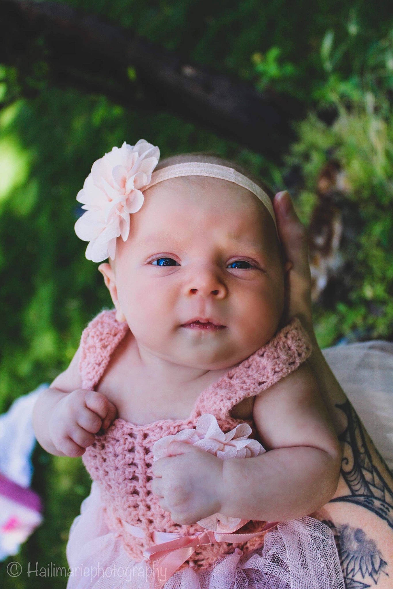 Dahlia is registered to the contest to win money with this photo: baby, baby_toddler_clothing, cheek, child, dress, embellishment, flash_photography, flower, grass, hand, happy, lip, person, petal, pink, plant, purple, skin, sleeve, textile