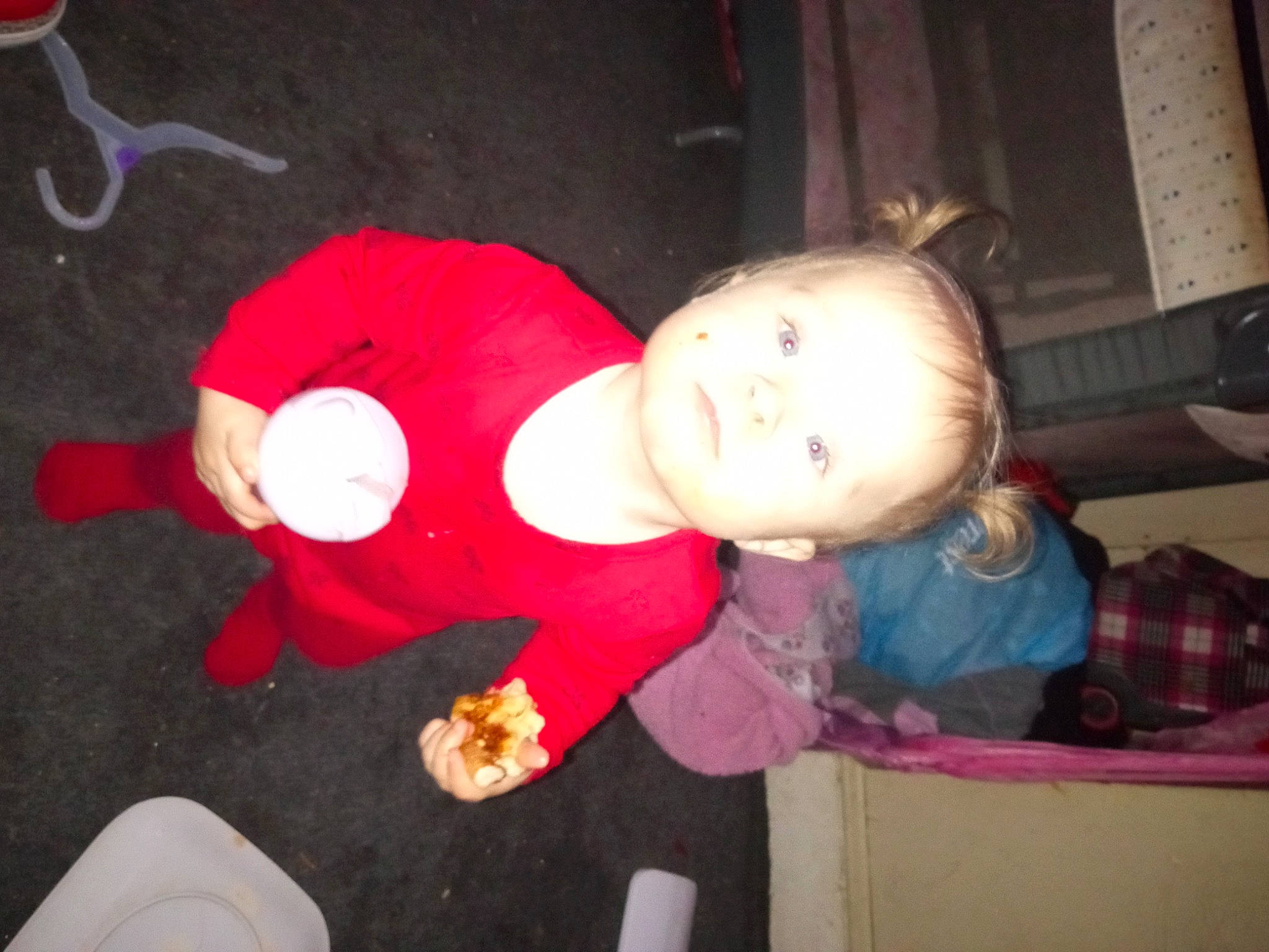 Nova is registered to the contest to win money with this photo: baby, baby_toddler_clothing, carmine, cheek, child, christmas_eve, costume, event, fictional_character, flooring, fun, hat, head, holiday, lap, person, sitting, toddler