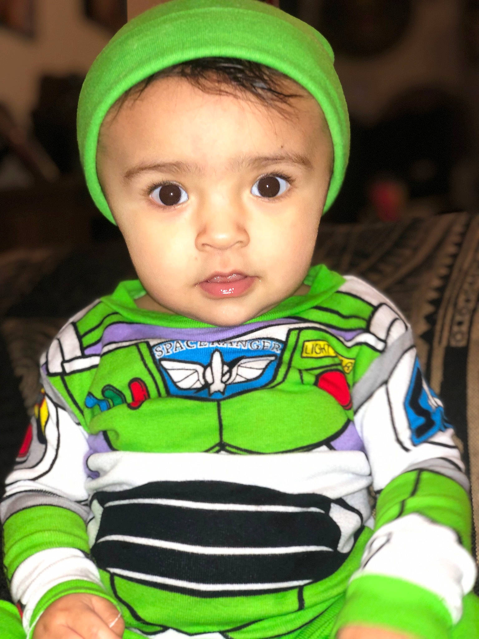 Amora is registered to the contest to win money with this photo: baby, baby_toddler_clothing, cap, cheek, child, cool, eye, eyebrow, fun, green, happy, headgear, neck, nose, organ, outerwear, person, skin, sleeve, t_shirt