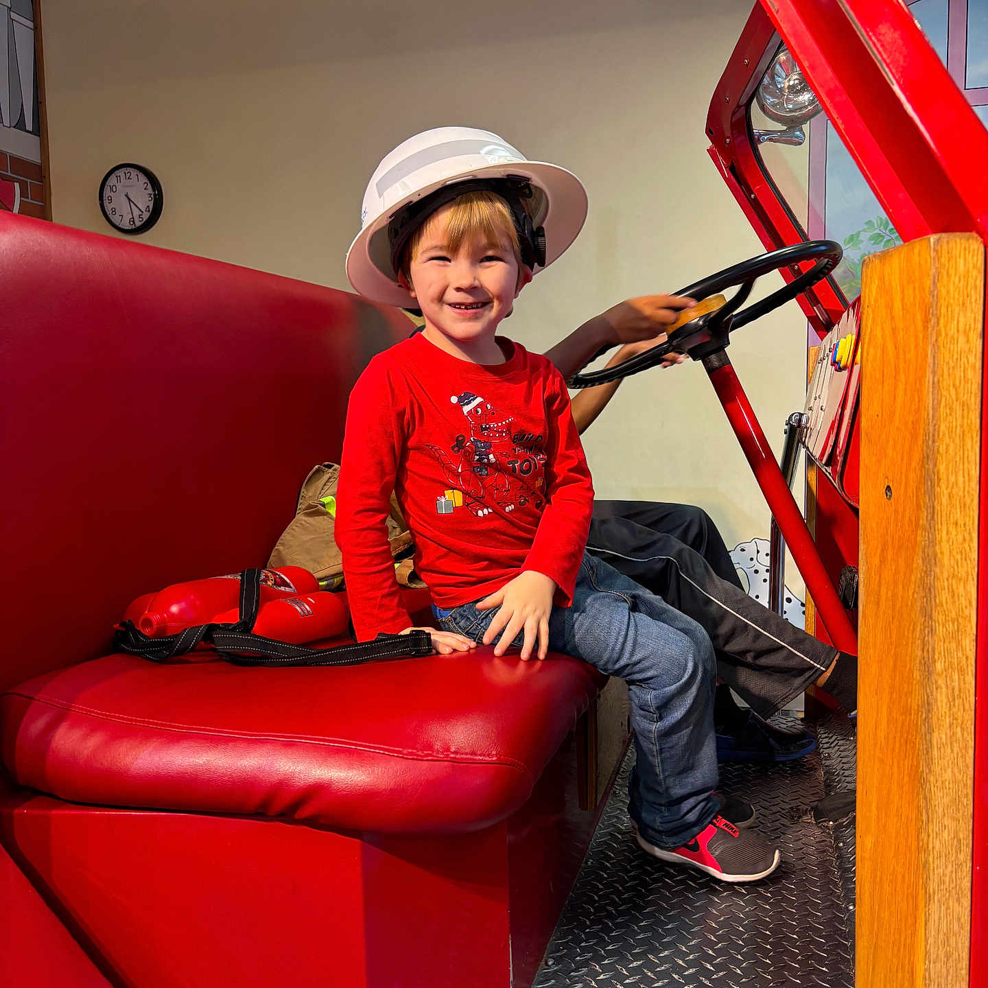 Darian Sage is registered to the contest to win money with this photo: accessories, bag, boy, child, clothing, couch, face, footwear, furniture, handbag, hat, head, helmet, male, pants, person, photography, portrait, shoe, sitting