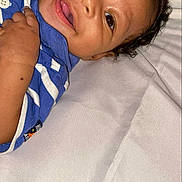 Micah is registered to the contest to win money with this photo: baby, babylaughing, face, happy, head, person, photography, portrait, smile