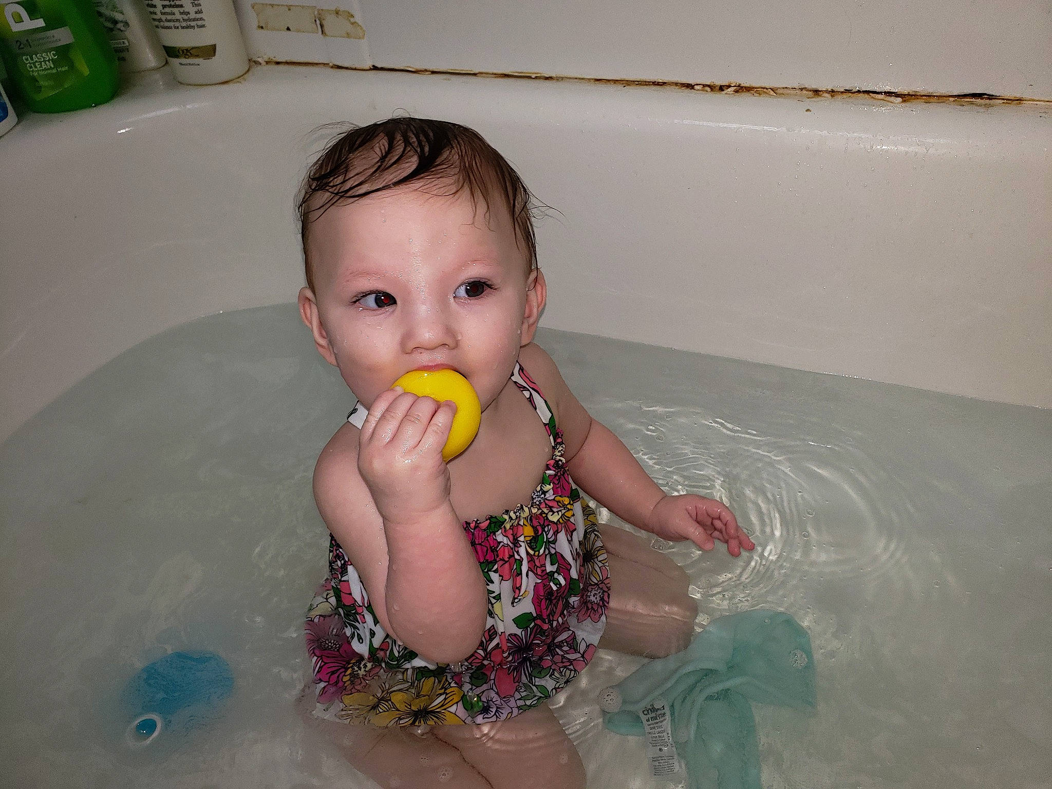 Kristen is registered to the contest to win money with this photo: baby, baby_products, bathing, bathtub, child, fun, leisure, person, play, product, skin, toddler