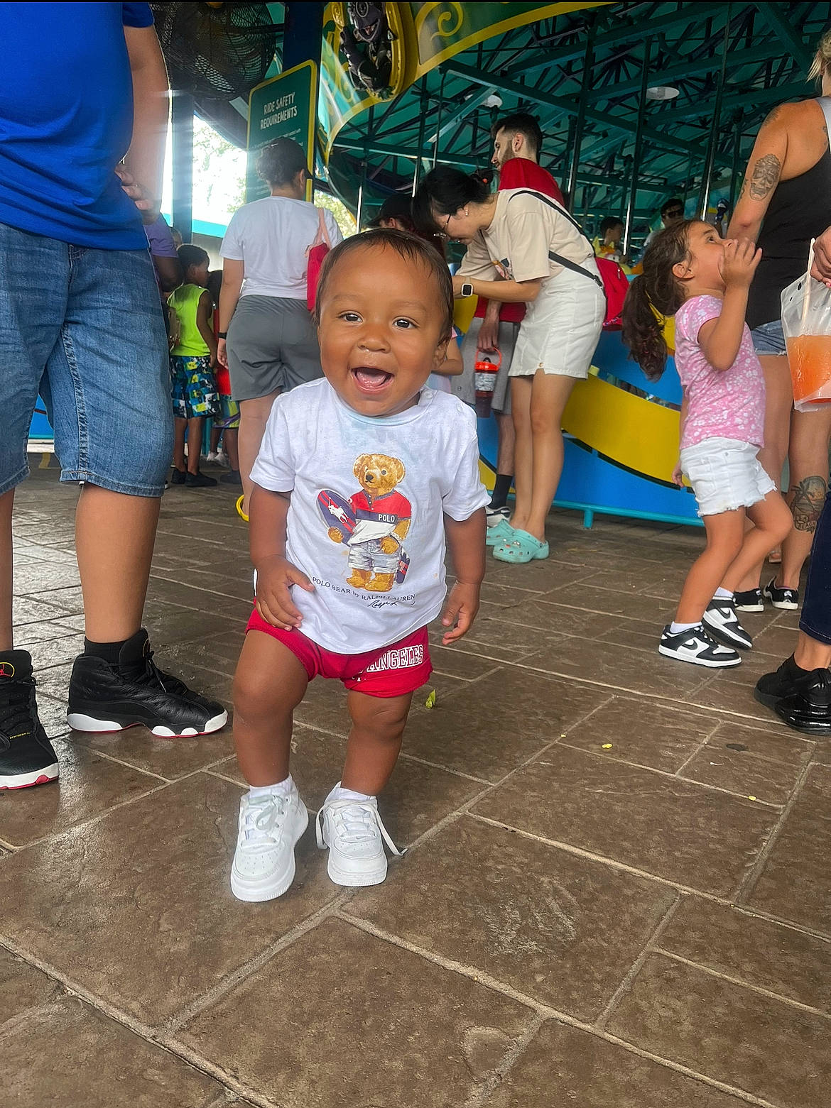 Josiah joined the competition — help win amazing prizes! clothing, flooring, footwear, fun, happy, leg, leisure, mammal, person, pink, public_space, recreation, shoe, shorts, smile, sneakers, t_shirt, thigh, toddler, vertebrate