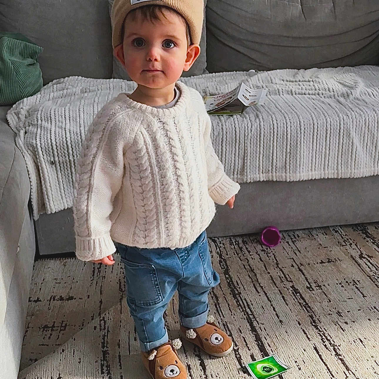 Eden participe au concours pour gagner de l'argent avec cette photo : boy, cap, child, clothing, couch, face, footwear, furniture, hat, head, jeans, knitwear, male, pants, person, shoe, sitting, sleeve, standing, sweater