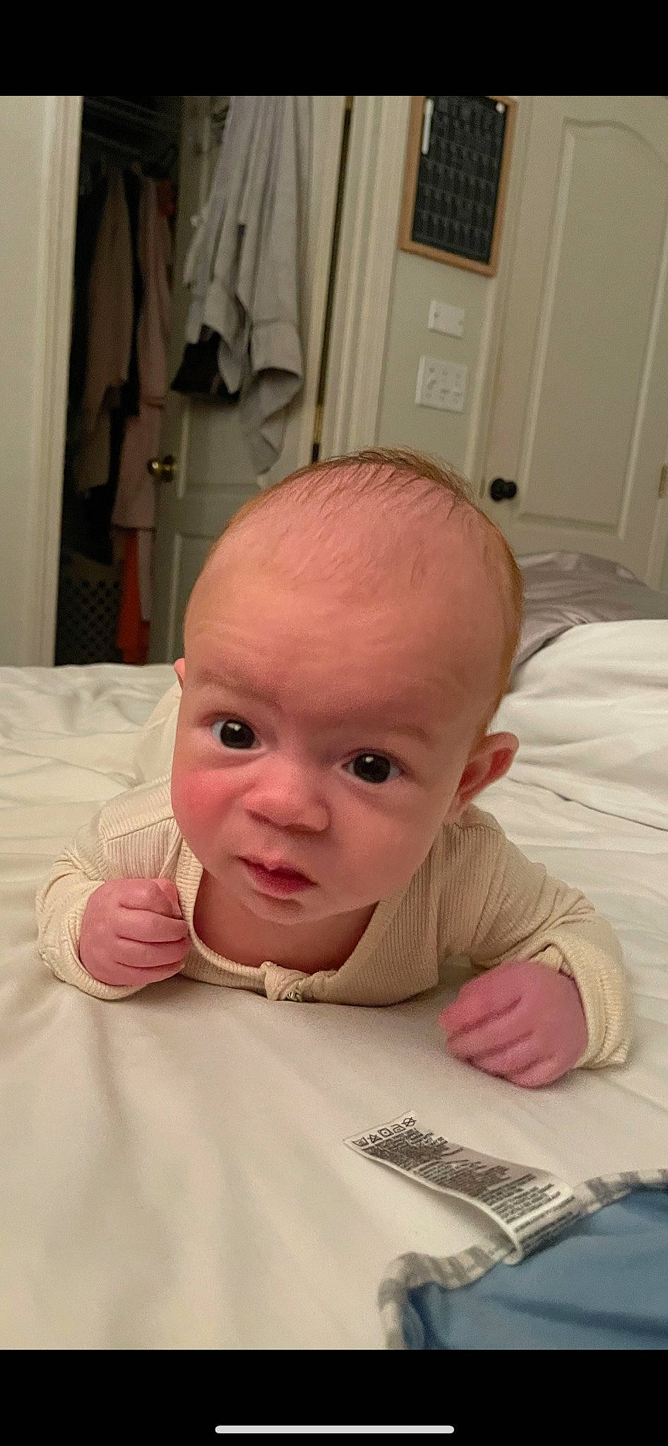 Rhys joined the competition — help win amazing prizes! baby, baby_toddler_clothing, cheek, child, comfort, curtain, door, eyebrow, eyelash, iris, linens, lip, mouth, nose, person, pink, room, skin, sleeve, smile