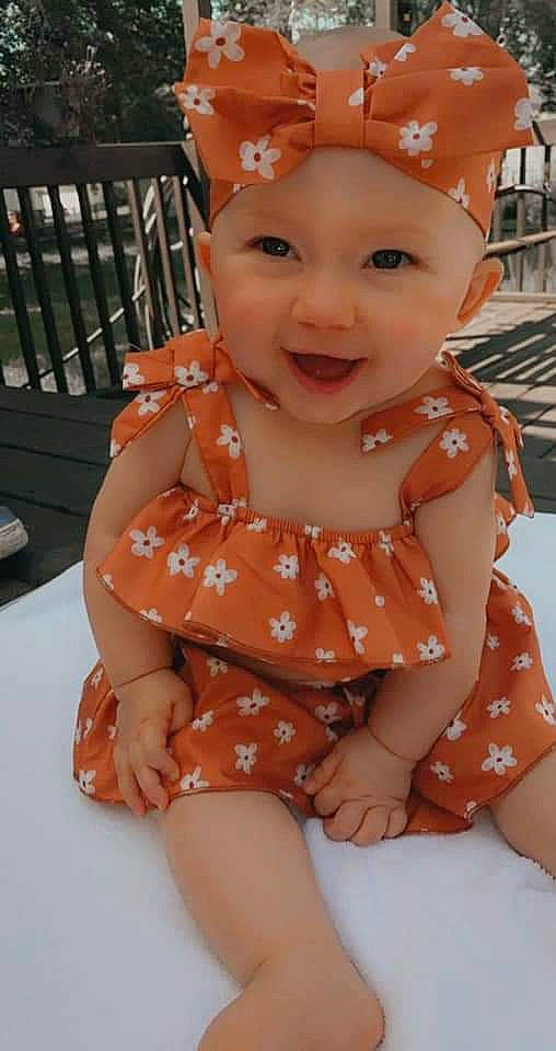 Hazel Rose joined the competition — help win amazing prizes! baby, baby_toddler_clothing, cap, cheek, child, chin, finger, foot, fun, happy, headgear, headwear, human_leg, pattern, person, pink, product, skin, sleeve, smile