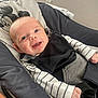 Joshua joined the competition — help win amazing prizes! baby, infant, smile, face, clothing, striped_shirt, black_overalls, baby_seat, mickey_mouse, cushion, happy, person, child, indoor, closeup, young_child, cute, portrait, seatbelt, comfortable