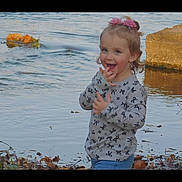 Natalie joined the competition — help win amazing prizes! animal, baby, bird, bodypart, clothing, face, finger, hand, happy, head, laughing, longsleeve, outdoors, pants, person, photography, portrait, sleeve, smile, water