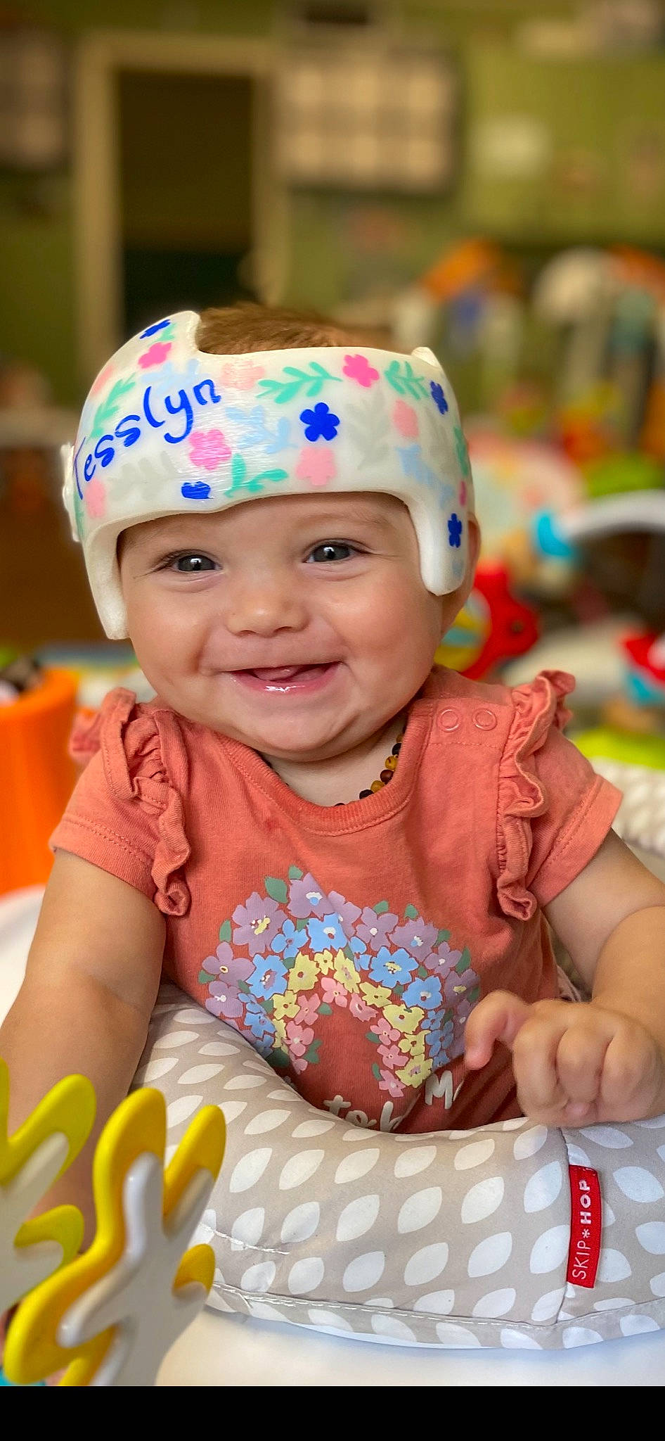 Tesslyn is registered to the contest to win money with this photo: baby, baby_playing_with_toys, baby_toddler_clothing, cap, child, face, facial_expression, fun, happy, head, headwear, human, joy, leisure, people, person, photograph, pink, product, skin