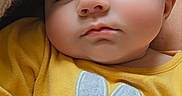 Raeleighana joined the competition — help win amazing prizes! baby, sleeping, yellow_clothing, bunny_applique, blanket, knitted_blanket, closeup, peaceful, infant, soft_lighting, portrait, cute, child, rest, cozy, indoors, small_person, adorable, calm, head