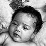 Beretta joined the competition — help win amazing prizes! baby, infant, curly_hair, black_and_white, portrait, face, skin, expression, blanket, texture, close_up, sleepy, newborn, relaxed, soft_light, young_child, laying_down, peaceful, cute, child