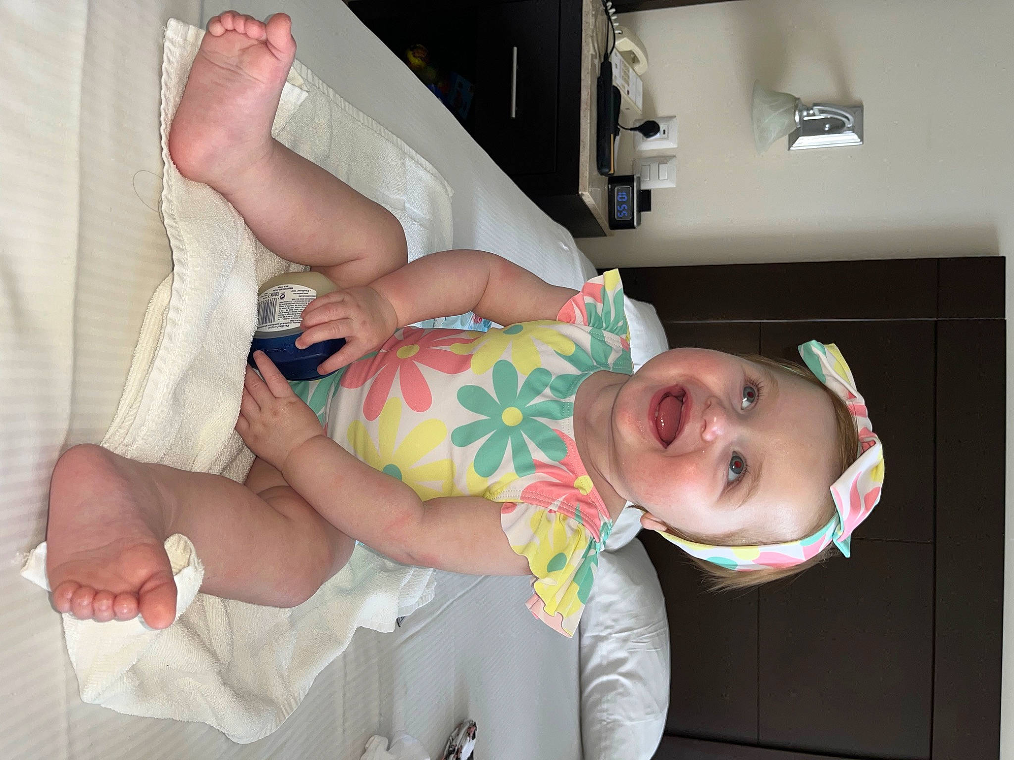 Laurencie is registered to the contest to win money with this photo: arm, baby, baby_toddler_clothing, child, comfort, elbow, event, finger, foot, hand, happy, human_leg, nail, person, room, skin, smile, thigh, thumb, toddler