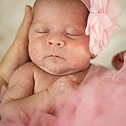 Emy participe au concours pour gagner de l'argent avec cette photo : newborn, baby, infant, pink, headband, flower, sleeping, peaceful, soft, tulle, hand, closeup, portrait, skin, cute, tiny, adorable, child, resting, serene