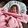 Amelia joined the competition — help win amazing prizes! baby, baby_seat, blanket, child, comfort, cozy, cushion, face, head, indoors, infant, newborn, peaceful, person, pink_blanket, portrait, resting, sleeping, soft_texture, warm