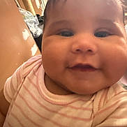 Amelia joined the competition — help win amazing prizes! baby, child, face, smile, cheeks, closeup, striped_clothing, pink, person, infant, cute, happy, indoors, portrait, young_child, head, hair, skin, baby_garment, chubby