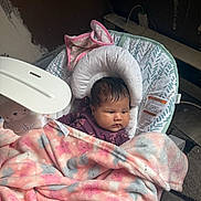Amelia joined the competition — help win amazing prizes! baby, blanket, carpet, child, clothing, comfort, cushion, cute, face, floor, hair, indoors, infant, pattern, pink, portrait, purple, rest, seated, toy