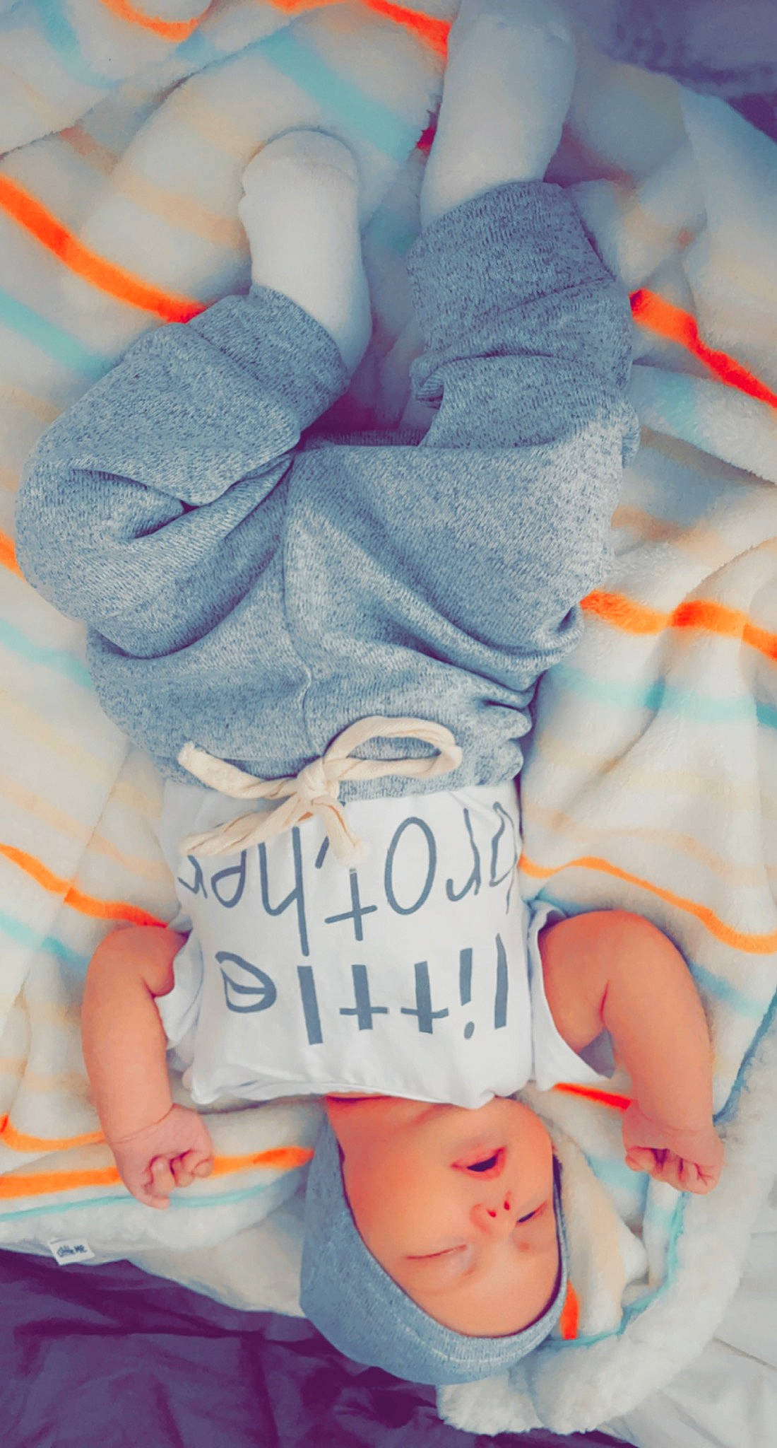 Prestyn is registered to the contest to win money with this photo: azure, baby_sleeping, baby_toddler_clothing, finger, font, gesture, happy, headwear, human, joint, knee, muscle, person, pink, product, skin, sleeve, t_shirt, textile, thigh