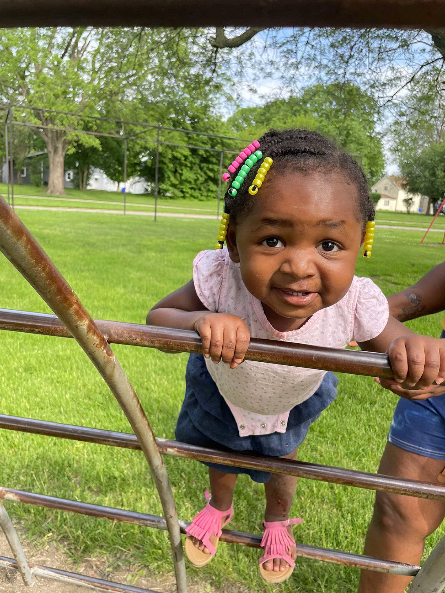 Juju joined the competition — help win amazing prizes! child, city, fence, fun, grass, happy, human_settlement, joy, leisure, outdoor_play_equipment, people_in_nature, person, plant, recreation, shorts, sky, smile, summer, swing, t_shirt