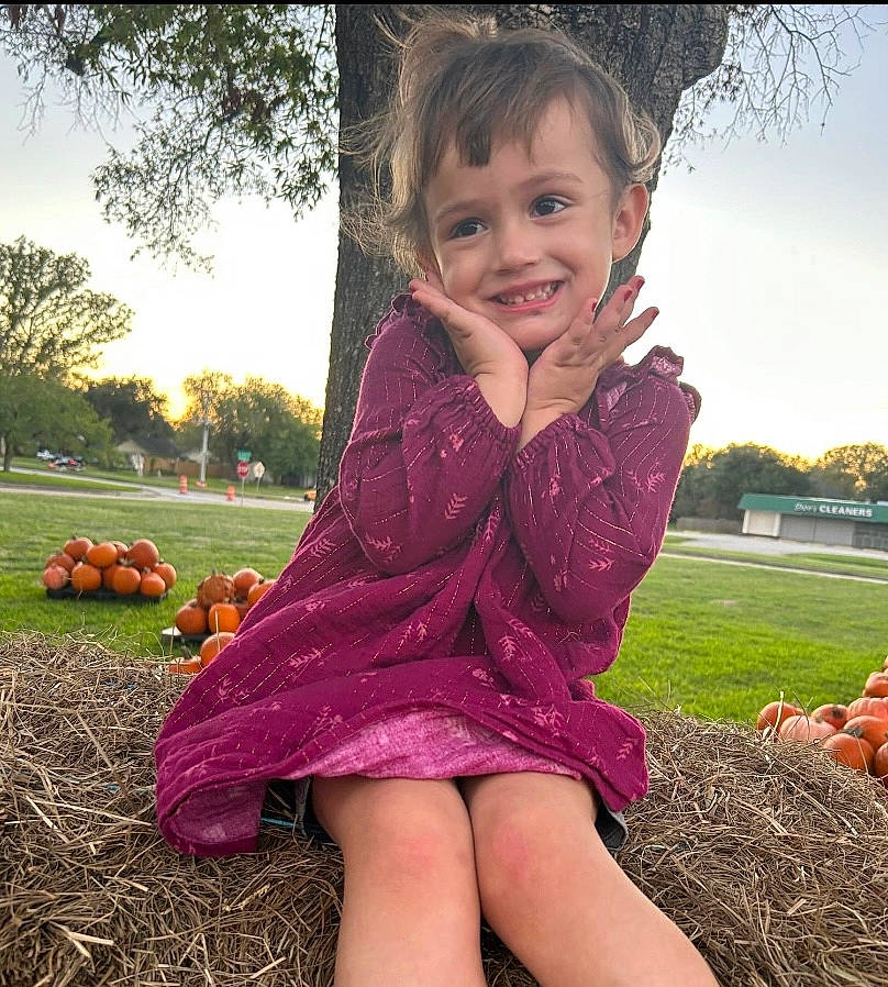 Holland joined the competition — help win amazing prizes! dress, face, grass, hair, happy, head, human_body, joy, leg, magenta, people_in_nature, person, photograph, pink, plant, sky, sleeve, smile, summer, thigh