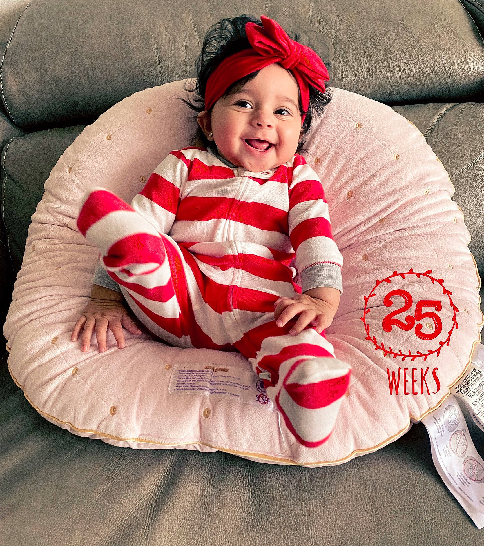 Amyra joined the competition — help win amazing prizes! baby, baby_toddler_clothing, carmine, child, christmas, comfort, eye, happy, head, headgear, headwear, human_leg, joy, lap, linens, pattern, person, pink, red, sleeve