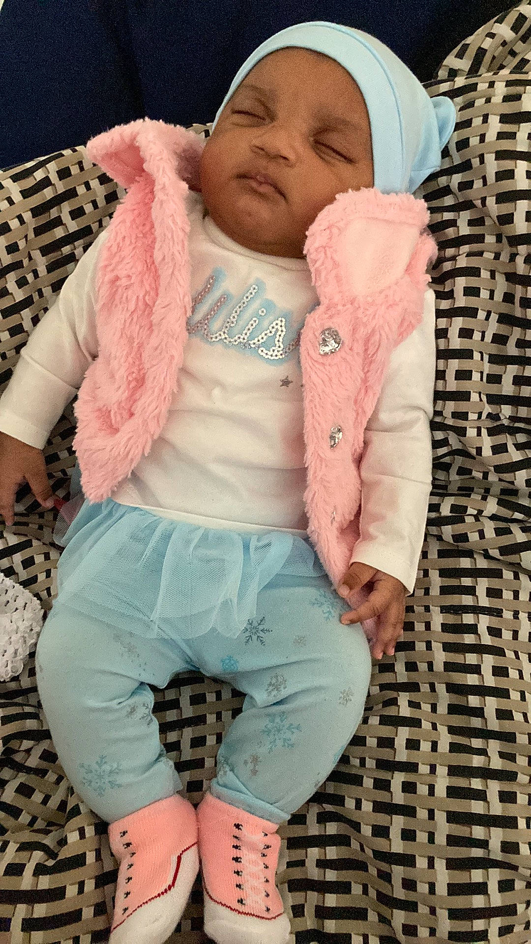 Imani joined the competition — help win amazing prizes! baby, baby_products, baby_toddler_clothing, cap, child, cool, fashion_accessory, green, happy, knit_cap, lip, outerwear, pattern, person, pink, skin, sleeve, thigh, toddler, waist