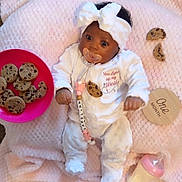 Lakelynn is registered to the contest to win money with this photo: baby, blanket, bottle, bow, child, chocolate_chip_cookie, clothing, cookie, cute, headband, infant, lying_down, milestone, milk, newborn, one_month, pacifier, personalized, pink, soft_texture