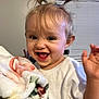 Kinsley joined the competition — help win amazing prizes! baby, child, happy, smiling, blanket, hair, indoor, face, expression, cute, clothing, person, toddler, hand, joy, window_blinds, skin, cheerful, playful, portrait