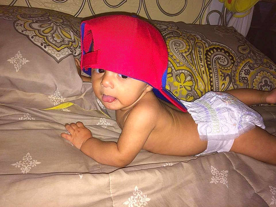 Milan is registered to the contest to win money with this photo: abdomen, arm, chest, child, eye, finger, girl, hand, headgear, human_hair_color, infant, leg, muscle, person, skin, thigh, trunk