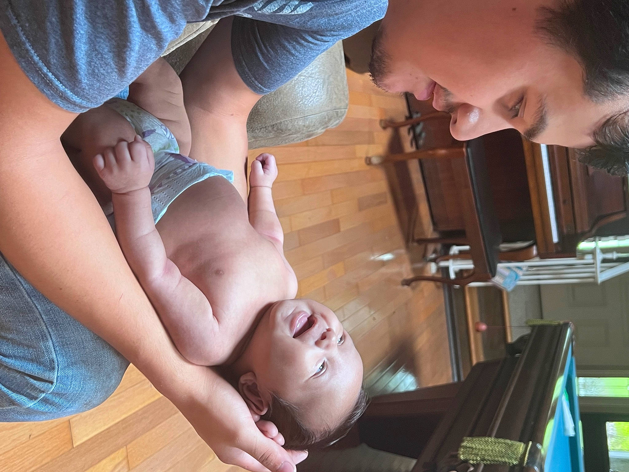 Kayden is registered to the contest to win money with this photo: abdomen, black_hair, chest, elbow, eyelash, eyewear, fun, gesture, glasses, joint, knee, mouth, muscle, organ, person, shorts, smile, stomach, sunglasses, thigh