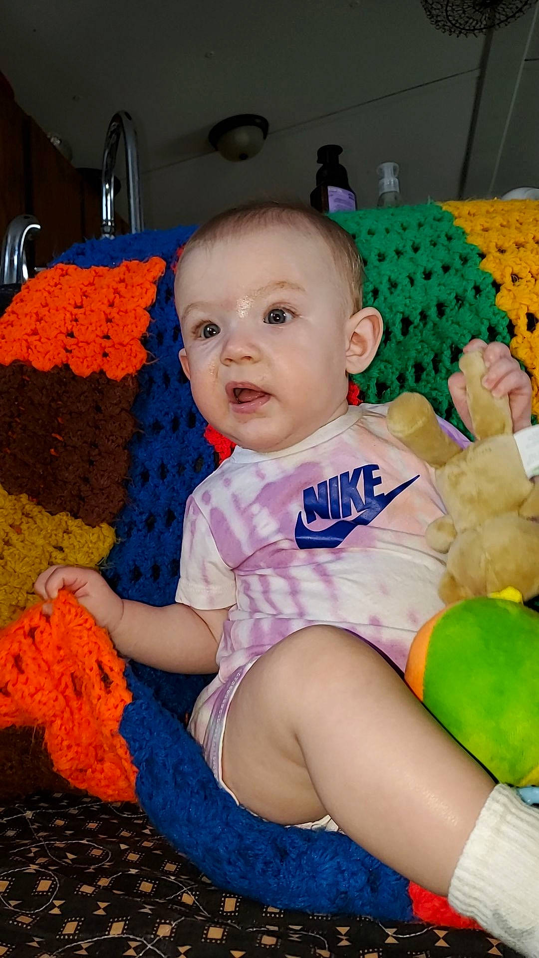 Athena joined the competition — help win amazing prizes! baby, baby_toddler_clothing, cheek, child, couch, electric_blue, eye, facial_expression, finger, fun, hairstyle, happy, iris, organ, person, product, sitting, skin, textile, toddler