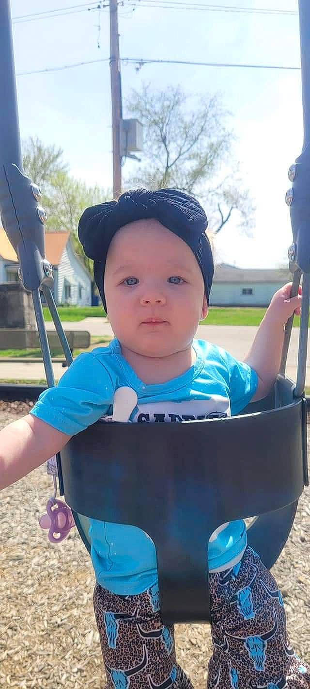 Athena joined the competition — help win amazing prizes! azure, baby, baby_toddler_clothing, baseball_cap, cap, child, electric_blue, fun, grass, happy, hat, headwear, leisure, outdoor_play_equipment, person, personal_protective_equipment, plant, recreation, sitting, sky