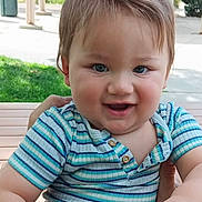 Konstantine joined the competition — help win amazing prizes! toddler, child, baby, smiling, outdoor, bench, striped_shirt, blue_shorts, cute, happy, portrait, person, grass, daylight, hand, casual_clothing, short_hair, playful, park, nature