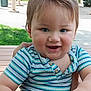 toddler, child, baby, smiling, outdoor, bench, striped_shirt, blue_shorts, cute, happy, portrait, person, grass, daylight, hand, casual_clothing, short_hair, playful, park, nature