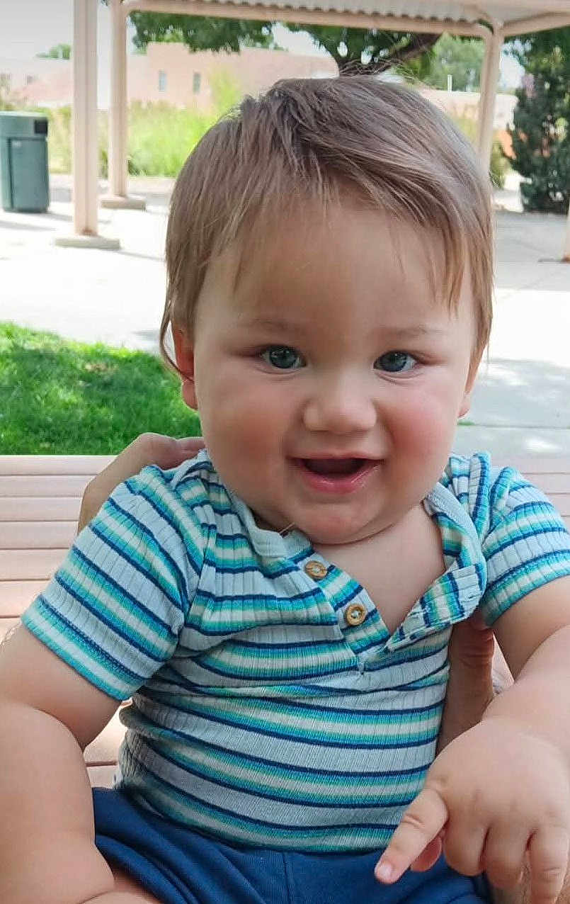 Konstantine joined the competition — help win amazing prizes! toddler, child, baby, smiling, outdoor, bench, striped_shirt, blue_shorts, cute, happy, portrait, person, grass, daylight, hand, casual_clothing, short_hair, playful, park, nature