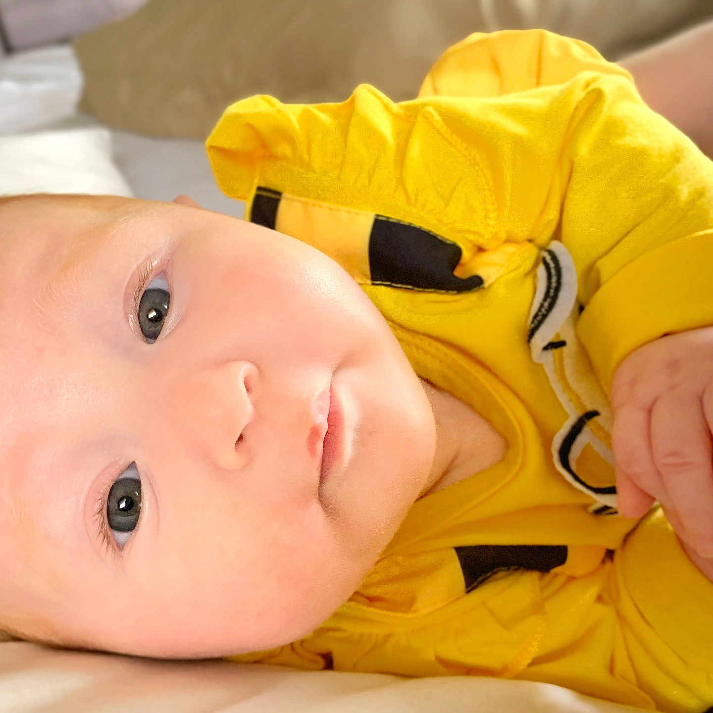 Molly Haze is registered to the contest to win money with this photo: baby, bodypart, clothing, coat, face, finger, hand, happy, head, hood, hoodie, jacket, knitwear, newborn, person, photography, portrait, smile, sweater, sweatshirt