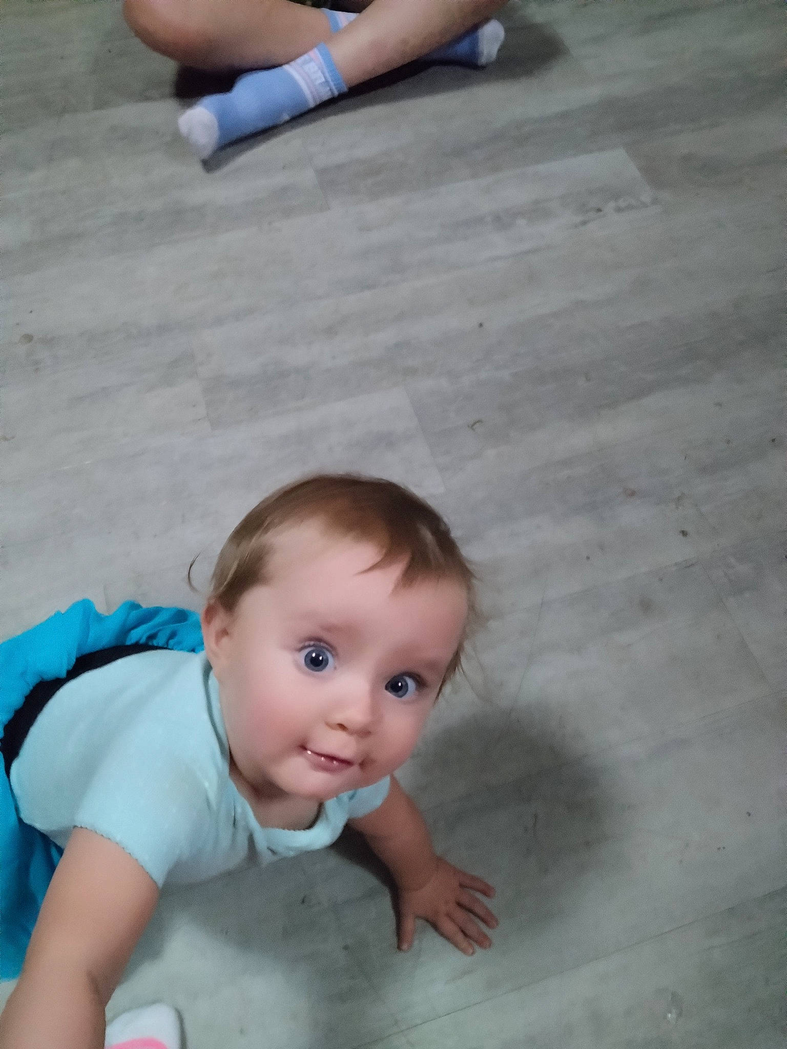 Treya joined the competition — help win amazing prizes! baby, baby_toddler_clothing, calf, cheek, floor, flooring, fun, gesture, happy, hardwood, human_leg, joint, knee, leg, leisure, person, skin, snapshot, thigh, toddler