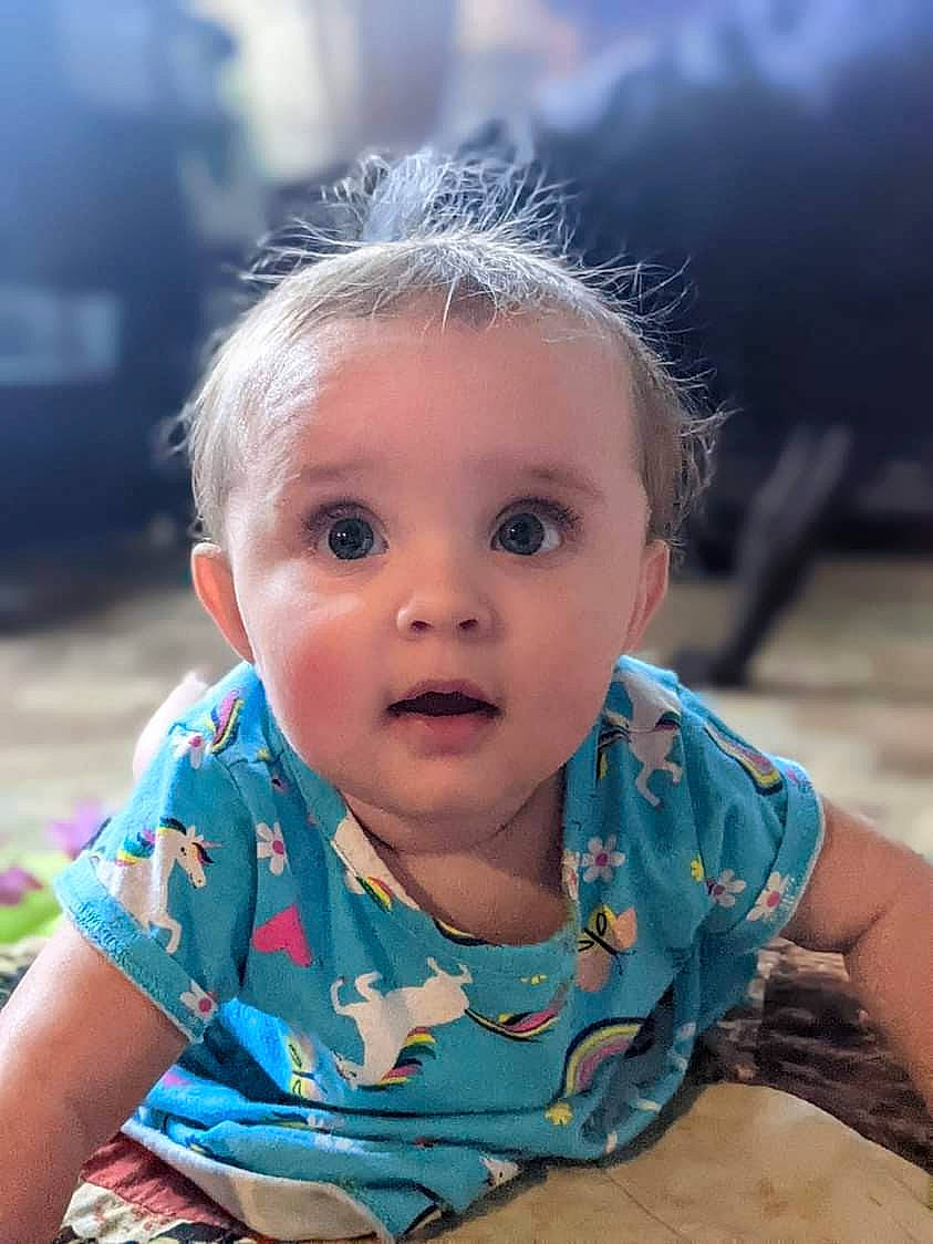 Treya joined the competition — help win amazing prizes! baby, baby_toddler_clothing, cheek, child, chin, eye, flash_photography, fun, grass, hair, happy, head, iris, leisure, nose, person, sitting, skin, sleeve, surprise