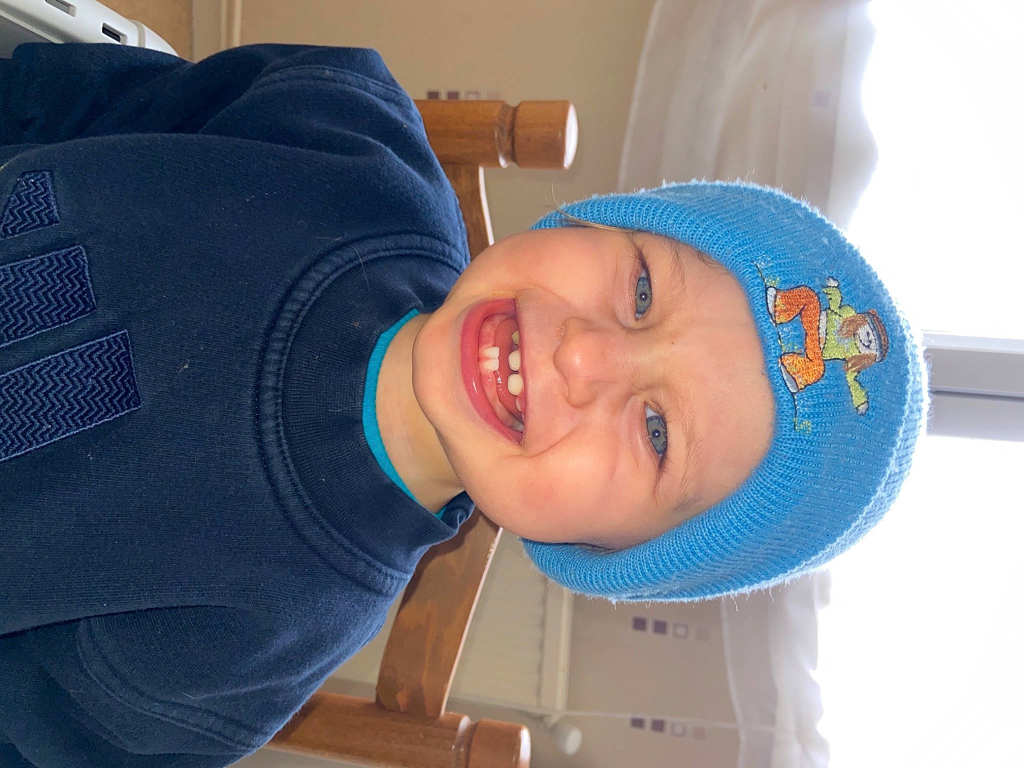 Ethan a rejoint le concours — aidez-le/la à gagner de superbes lots ! azure, baby_laughing, baby_toddler_clothing, baseball_cap, cap, child, chin, comfort, electric_blue, eye, fashion_accessory, fun, happy, hat, headwear, laugh, mouth, nose, person, sleeve