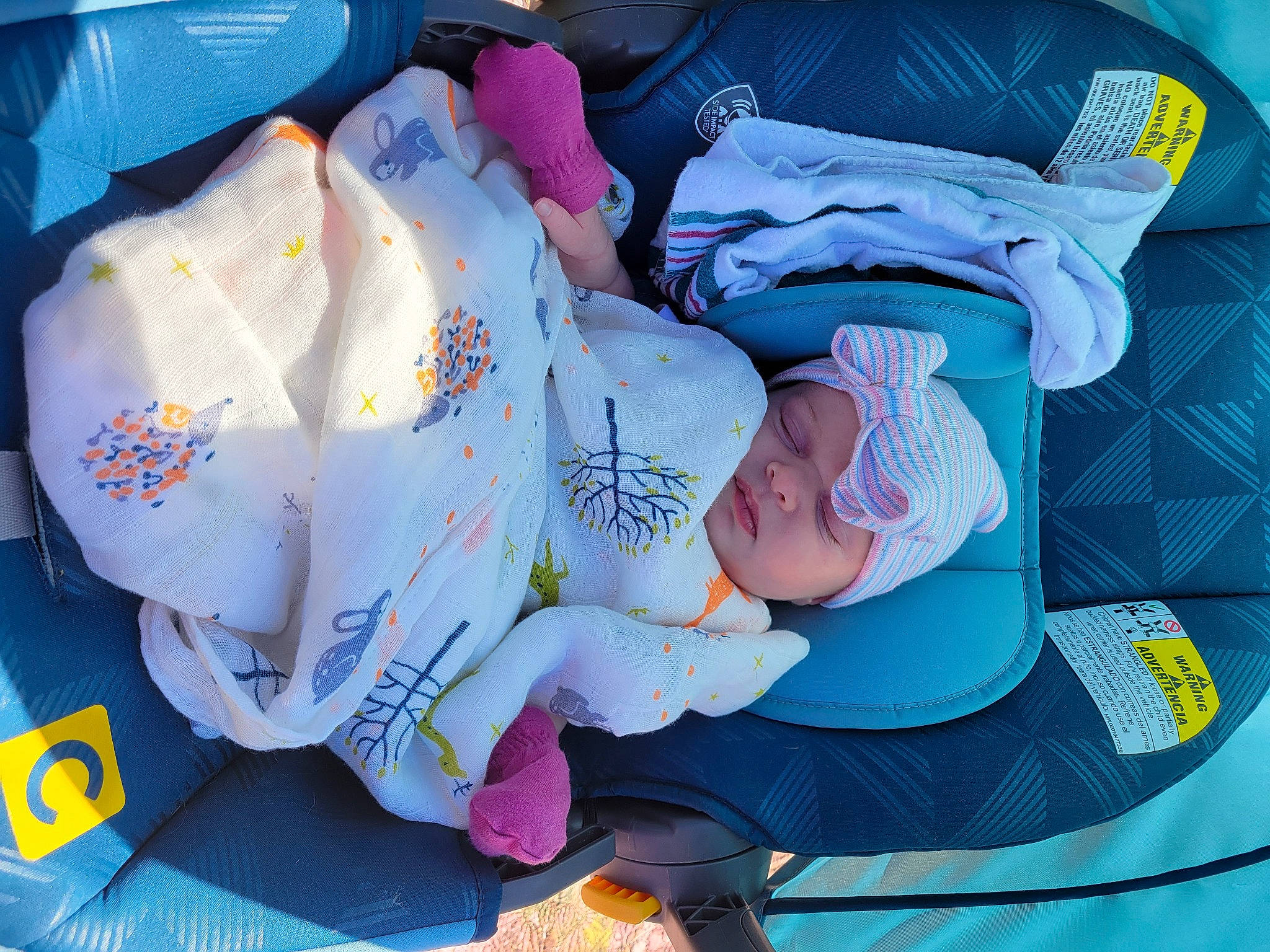 Moira is registered to the contest to win money with this photo: baby, baby_products, baby_toddler_clothing, carmine, child, comfort, electric_blue, headwear, linens, nap, pattern, person, plastic, product, room, sleep, smile, toddler