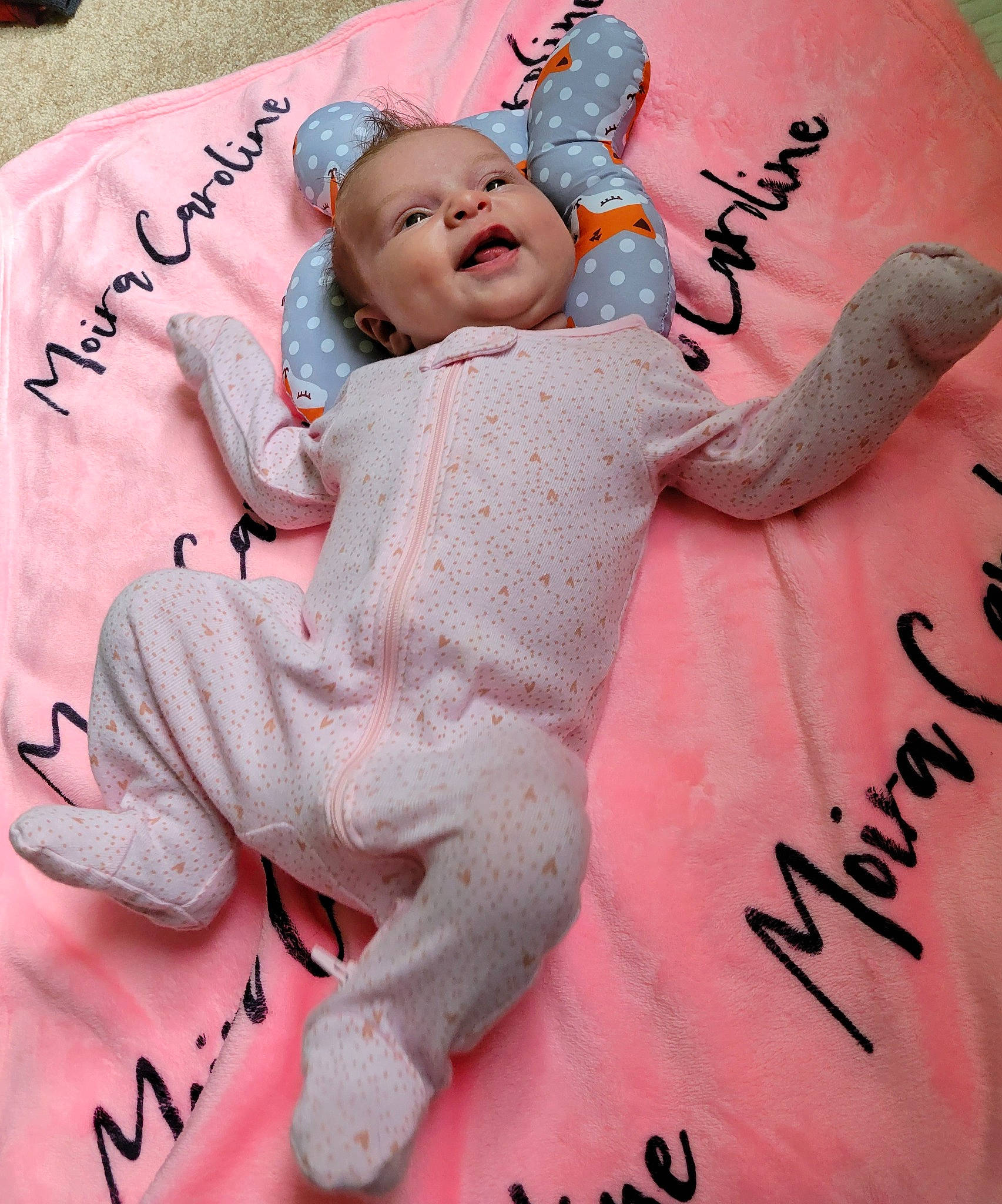 Moira joined the competition — help win amazing prizes! baby, baby_products, baby_toddler_clothing, carmine, cheek, child, fashion_accessory, finger, flesh, font, gesture, happy, magenta, pattern, peach, person, pink, skin, sleeve, toddler
